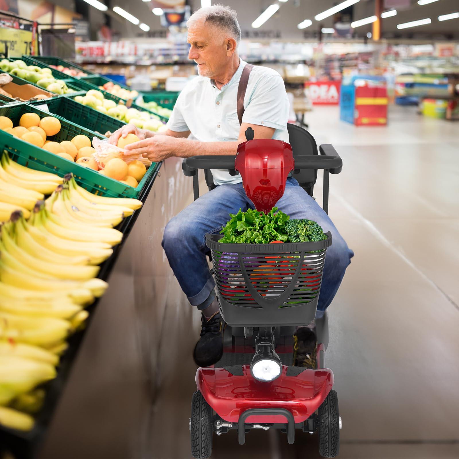 Red mobility scooter with a black front basket full of groceries, used by a man in a supermarket.