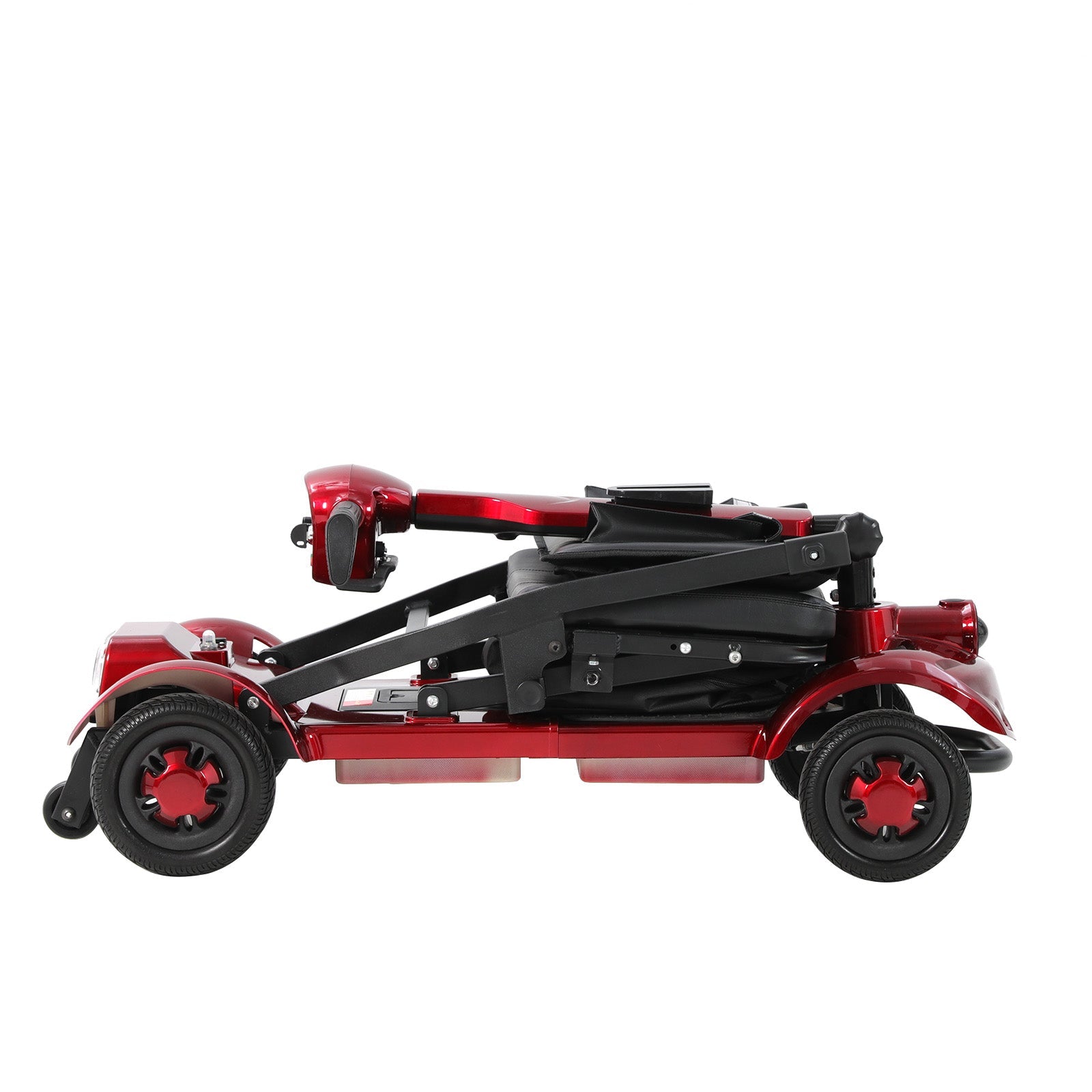 Red Mbxcooter M1F lightweight foldable travel scooter, compact and ready for transport.