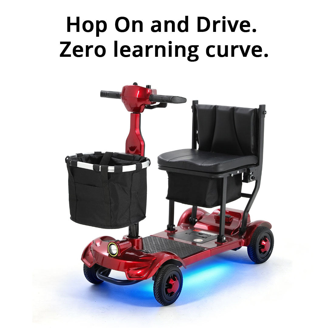 Red Mbxcooter M1F lightweight foldable travel scooter with black seat, basket, and blue underglow.